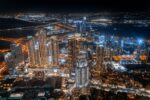 an aerial view of Dubai city at night