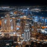 an aerial view of Dubai city at night