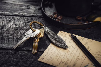 Property keys and Italian documents illustrating the process of paying property taxes in Italy.